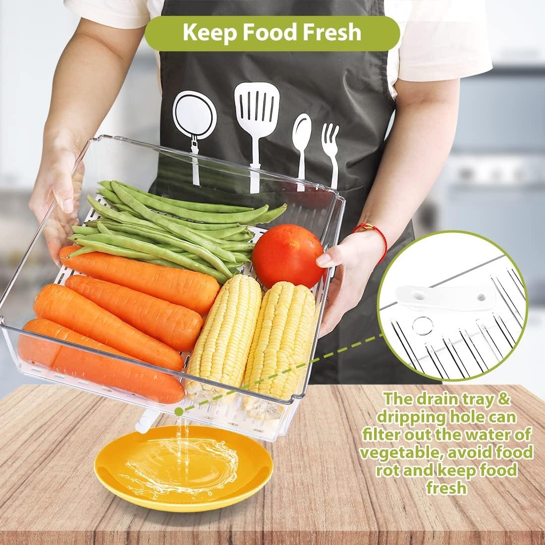 Clear organizer bins used in a pantry cabinet holding snacks and dry goods
