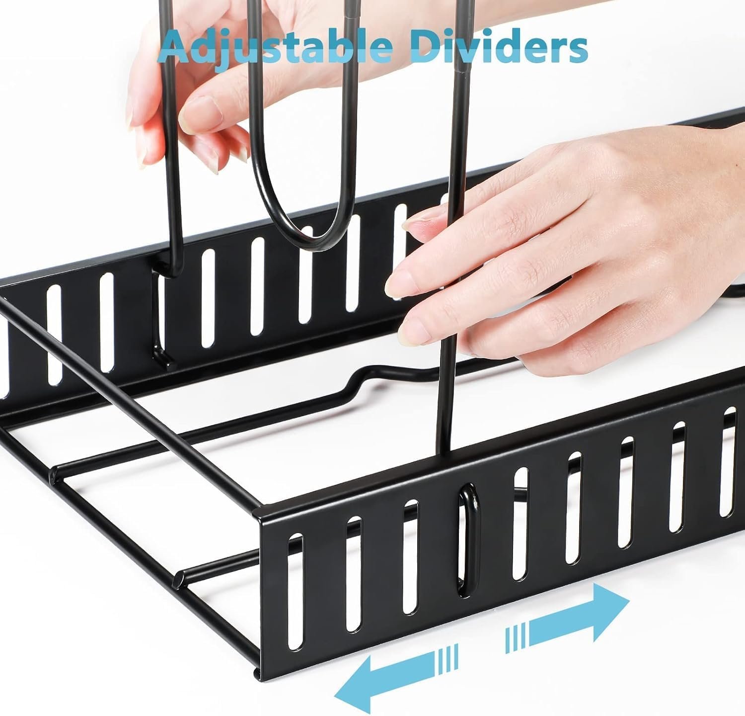 Pot and pan organizer holding lids and cookware in a lower cabinet